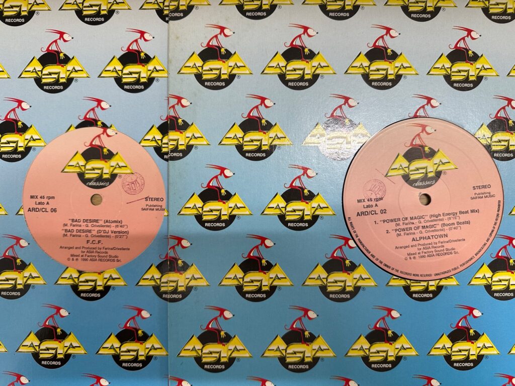 ASIA Recordsのロゴ柄ジャケットに、Alpha「Power of Magic」と「Bad Desire」のレコード2枚が並んでいる。
